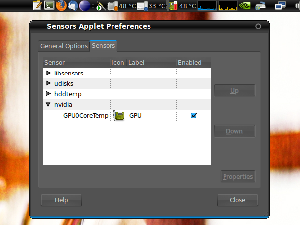 図3　画面上部のGNOMEパネルに表示されているのがGNOME Sensors Applet。表示項目は自由に設定でき、筆者は左からCPU0、ルートパーティションの入ったハードディスク、グラフィックカードそれぞれの温度を表示している