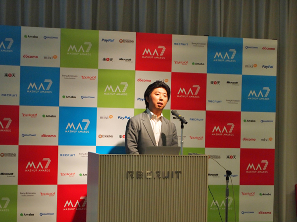 7回目の開催にあたり、挨拶を述べるMA7実行委員会委員長 羽野仁彦氏